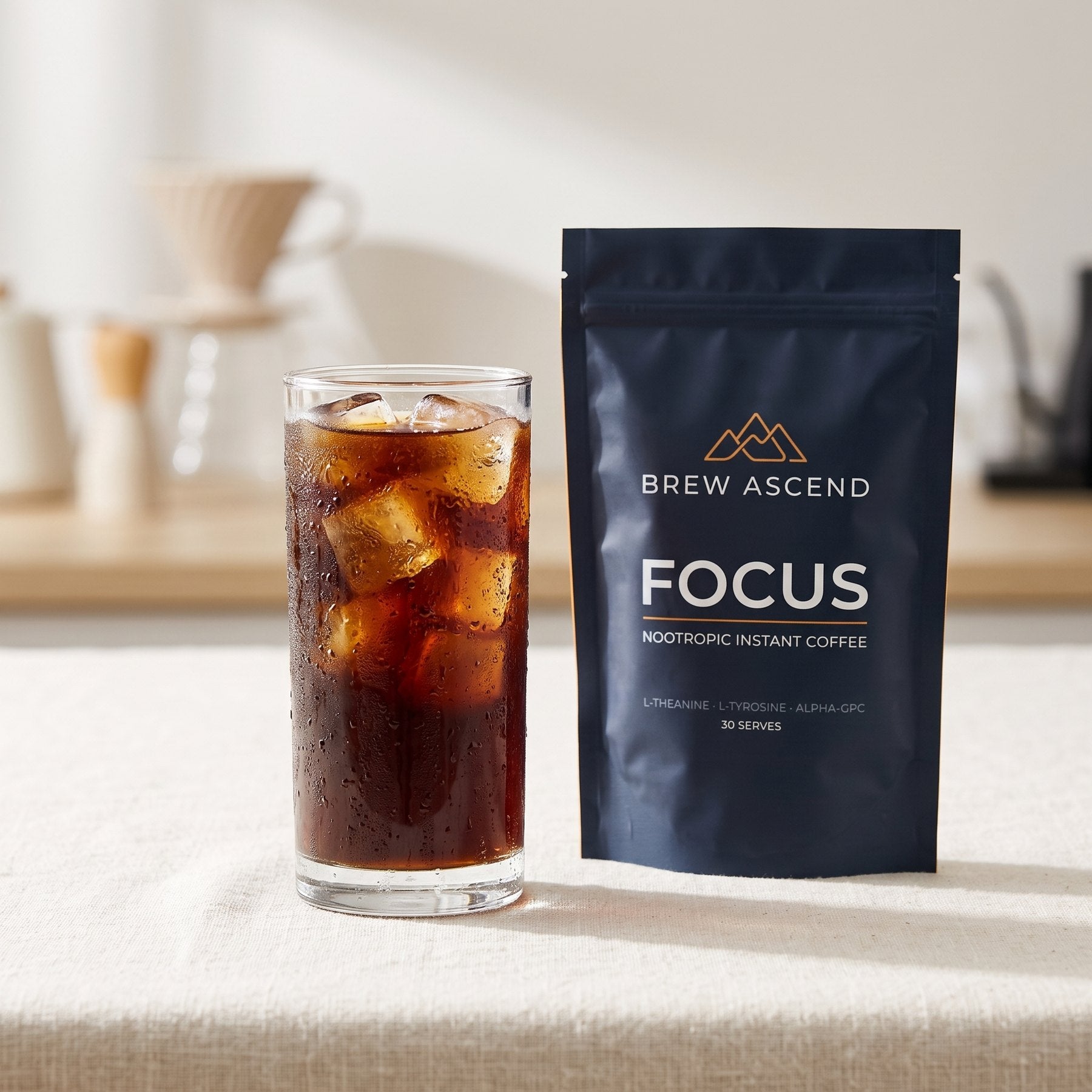 ASCEND FOCUS served over ice beside the pouch